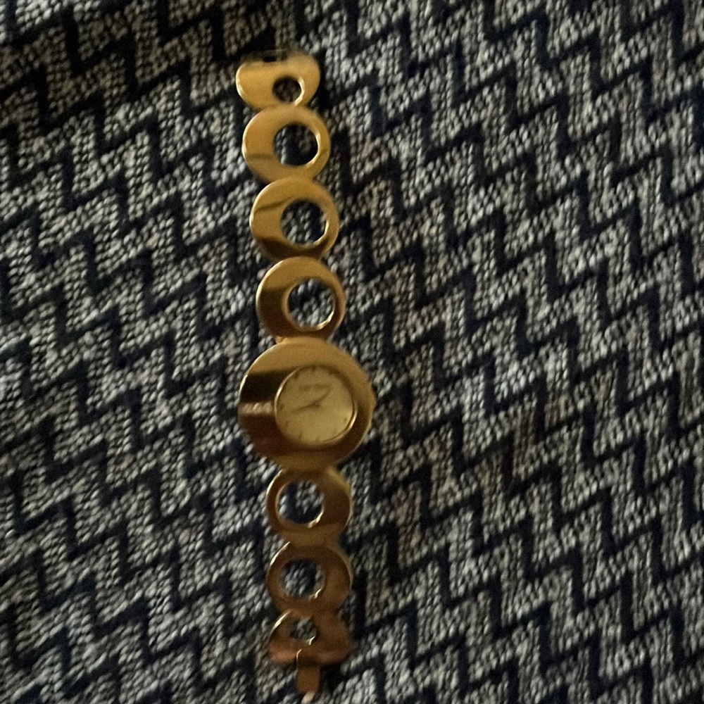 Beautiful woman’s gold watch.